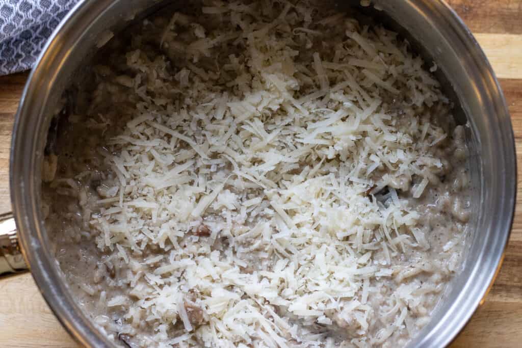 Grated parmesan scattered on top of the risotto.