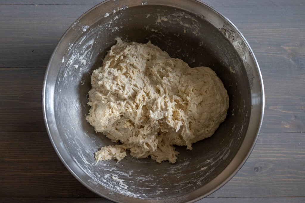 A soft and sticky dough in a bowl.