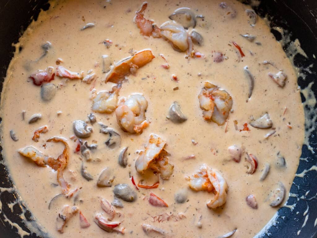 Cooked shrimp added back into the creamy tomato sauce.