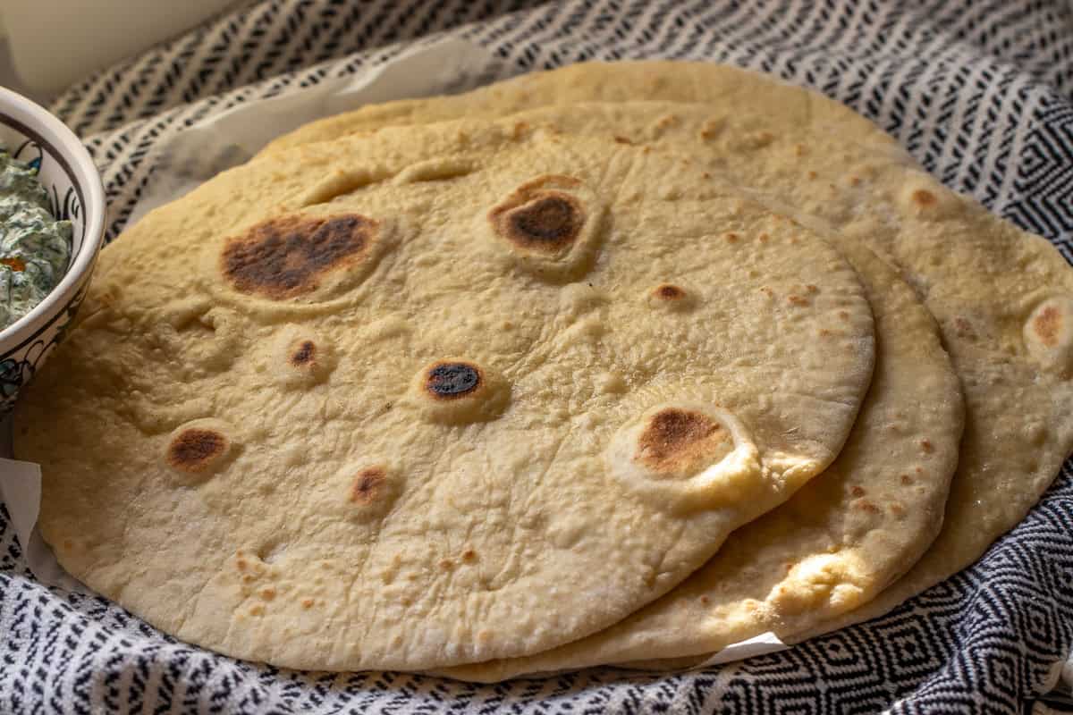 6 pieces of pita bread lightly brushed with butter.
