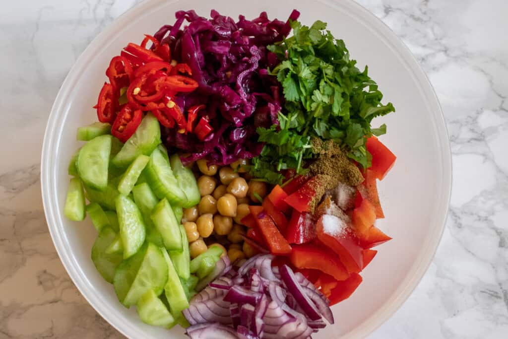 place the vegetables and coriander in a bowl