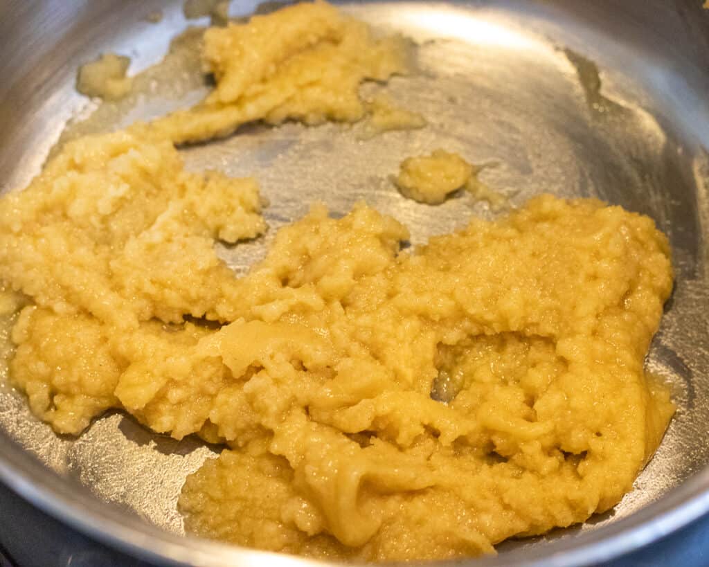 Flour and melted butter mixed in a pan to make the roux.