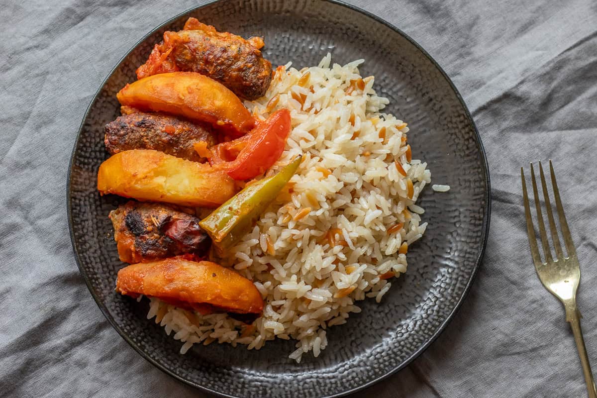Izmir kofte is served with Turkish rice.