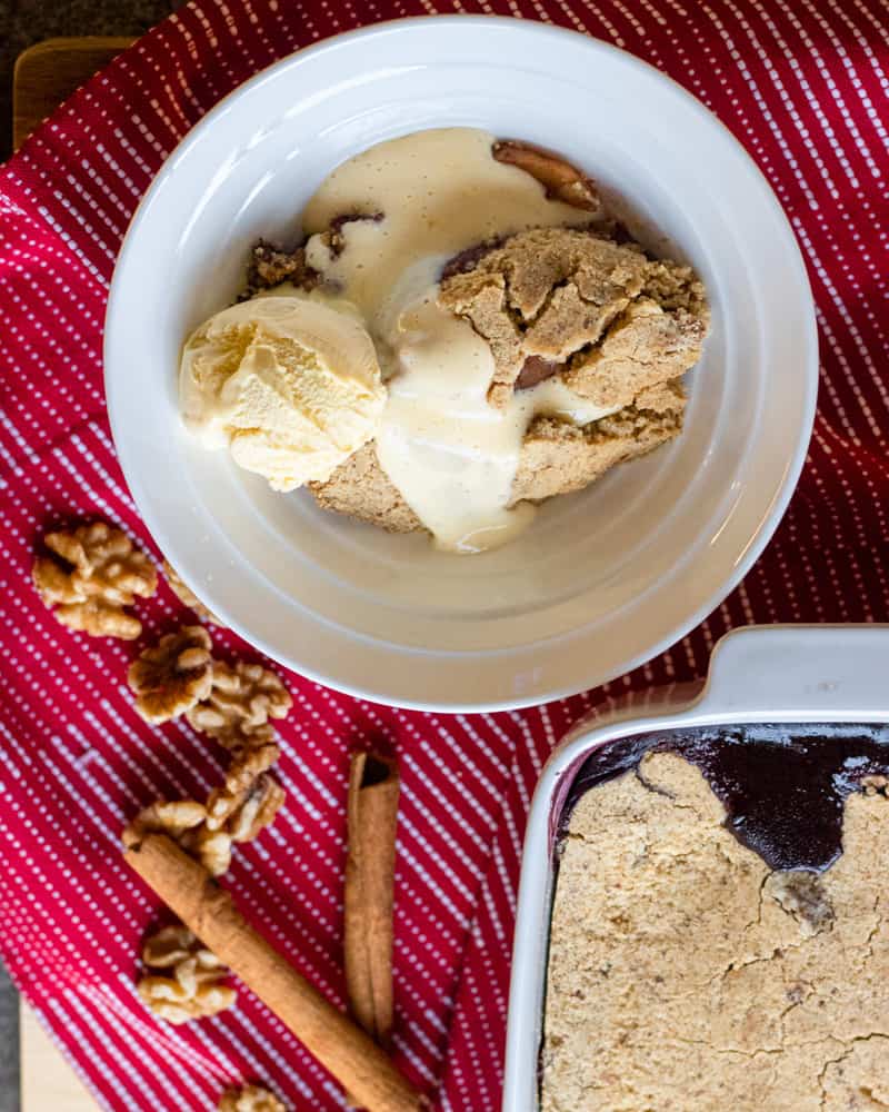 apple and blueberry crumble served with warm custard and ice cream