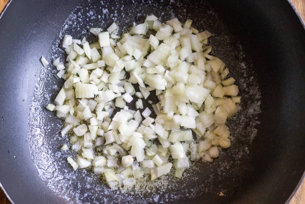 Sautéing the onions with butter.