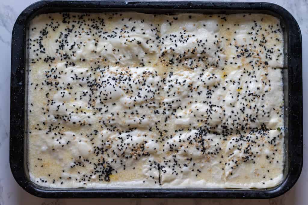 Meat and spinach pie is ready to bake.