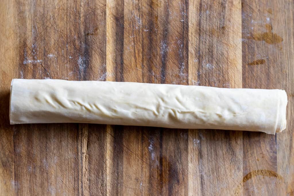 Lamb köfte wrapped in layered yufka pastry.