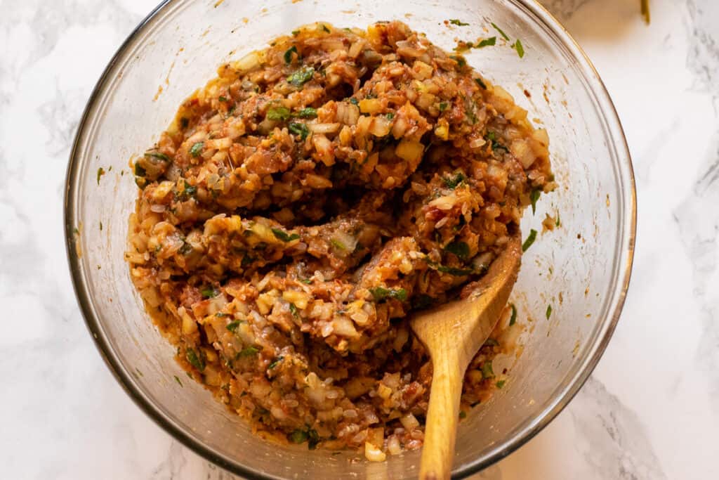 The meat mixture for stuffing the grape leaves.
