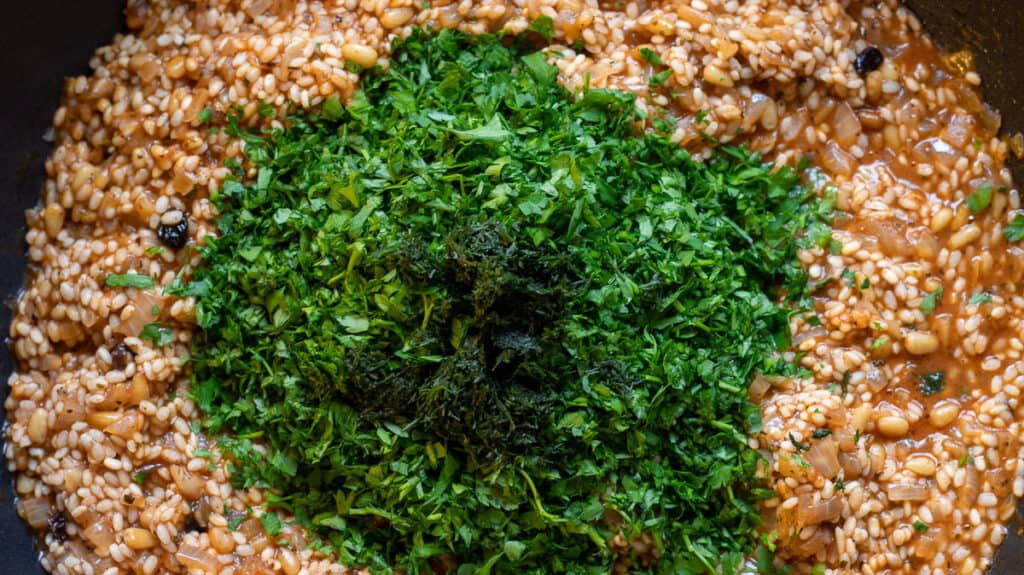 add the herbs to rice