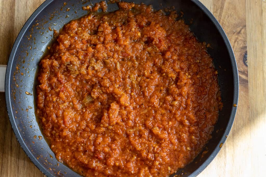 cook until the tomatoes are softened