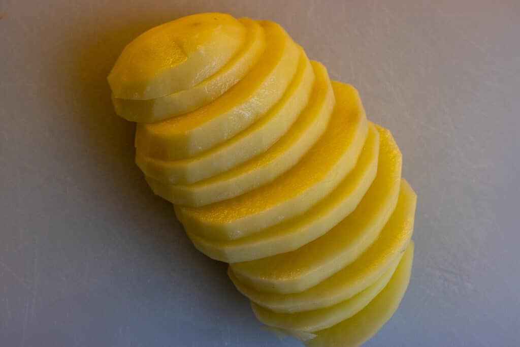 Peeled and sliced potatoes.