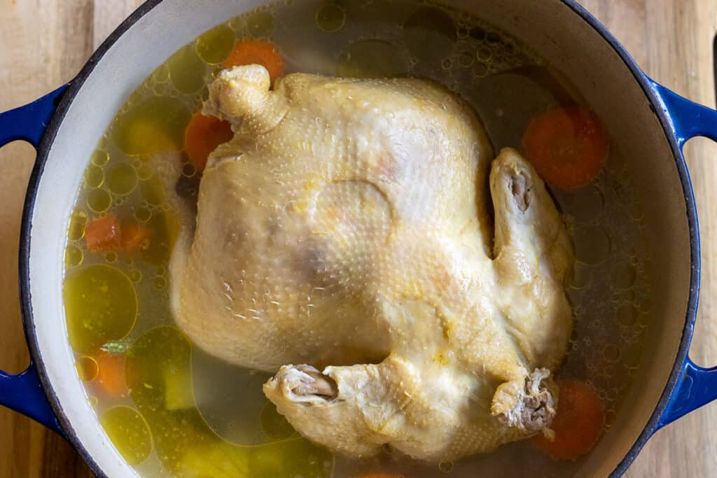 The chicken is cooked for an hour.