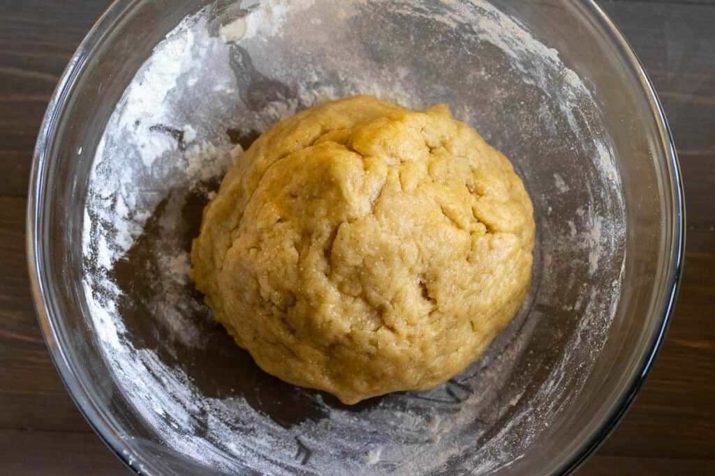 A soft dough is formed by mixing the dry ingredients with the wet ingredients.