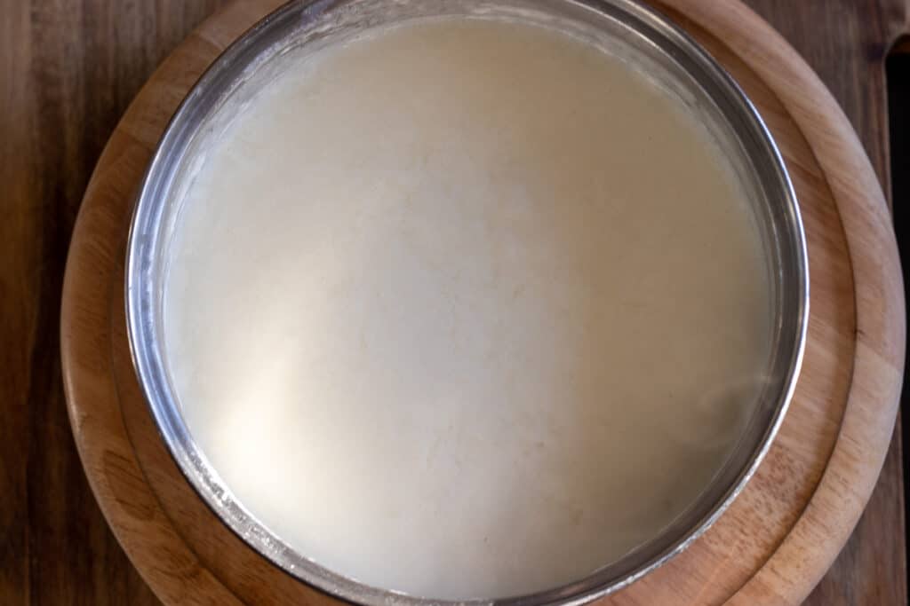 The soup simmering until the rice is soft.