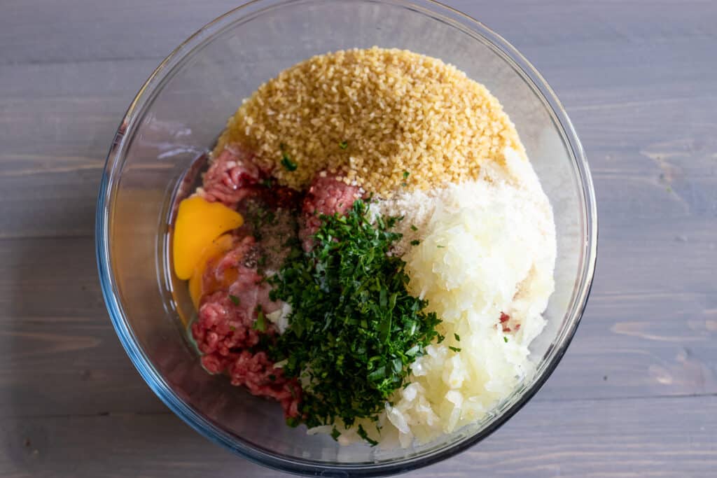 The meatball ingredients are placed in a bowl.