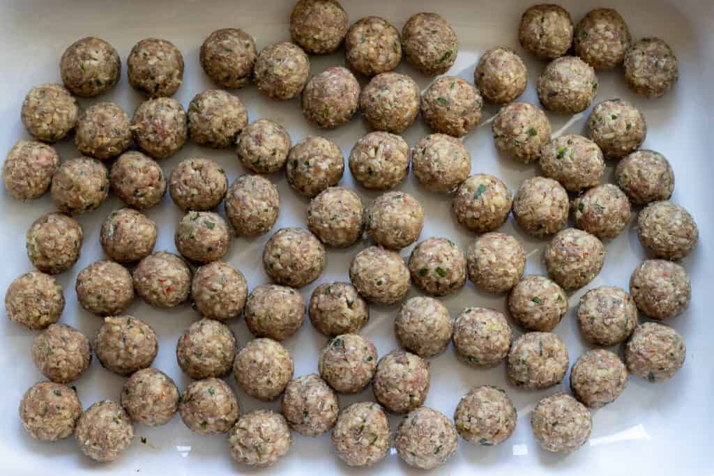 Kofte mixture is shaped into small balls.