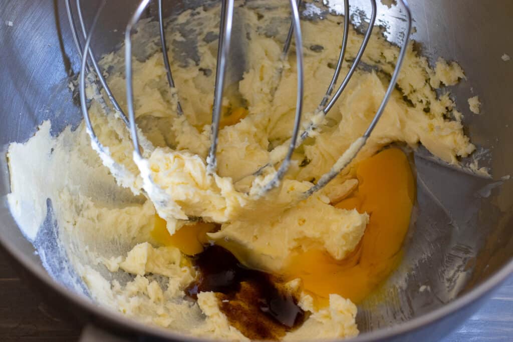 Egg and vanilla added to the creamed butter and sugar.