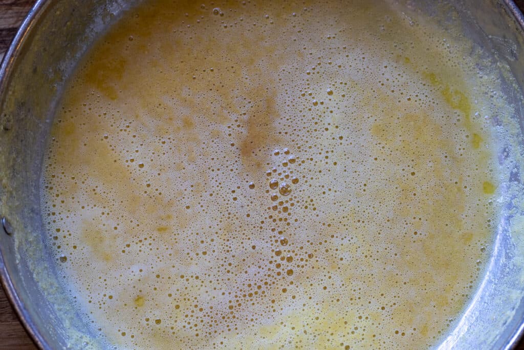 Water added into toasted cornmeal.