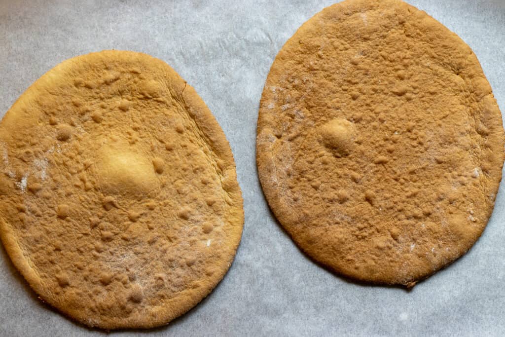 2 dough circles are baked until golden and crispy.