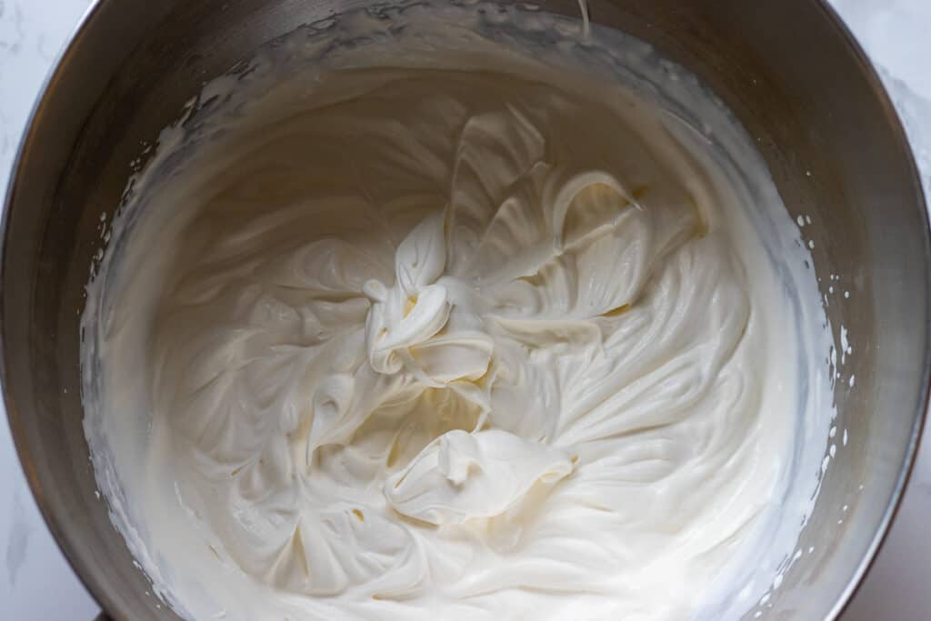 Heavy cream is whipped until stiff.