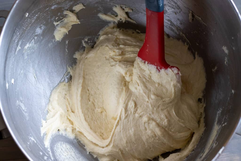 Dry ingredients are gently folded into wet ingredients.
