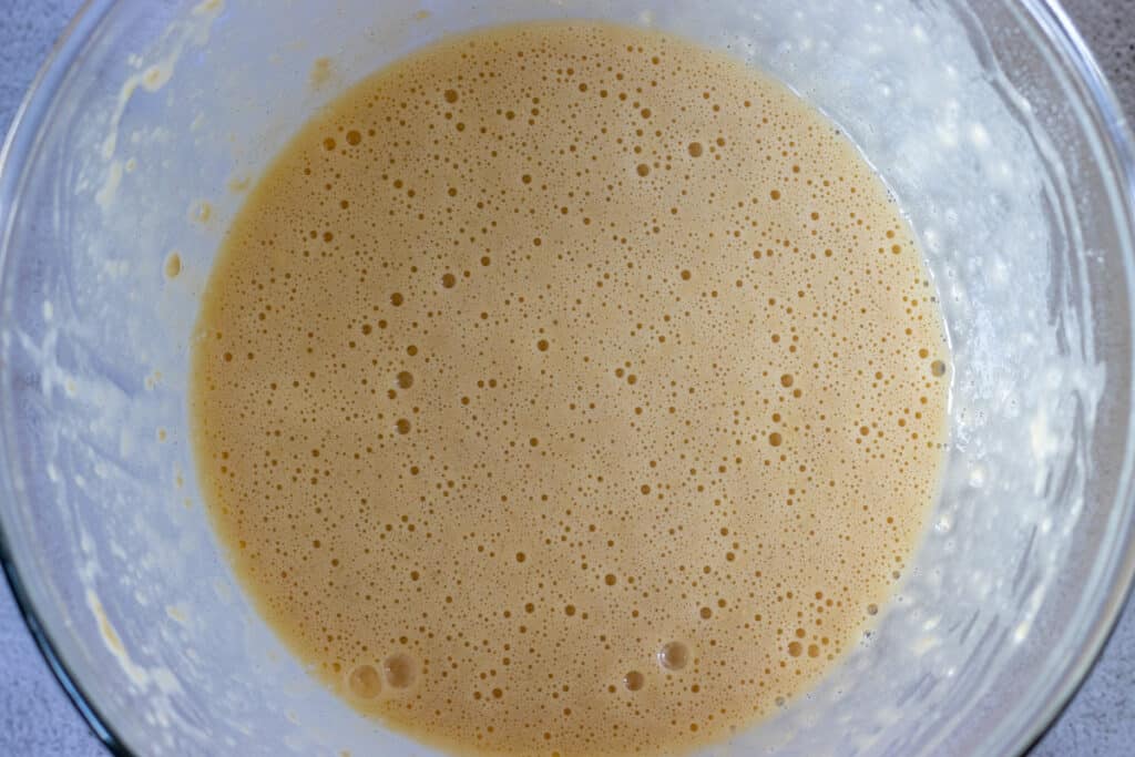 The milk whisked into the eggs.