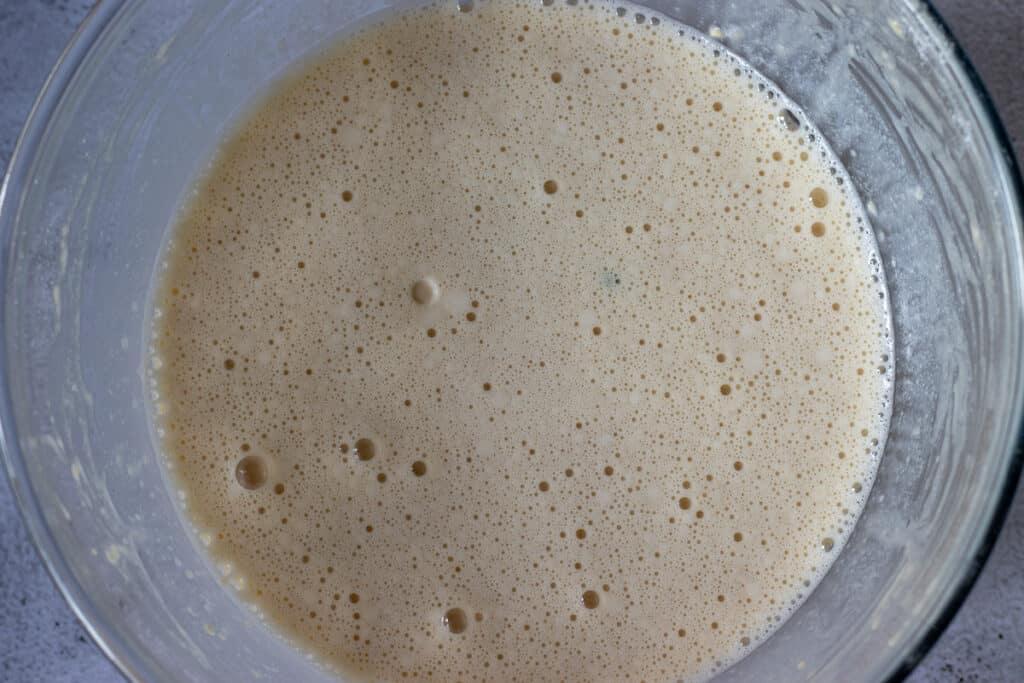 The flour added to the egg and milk mixture.