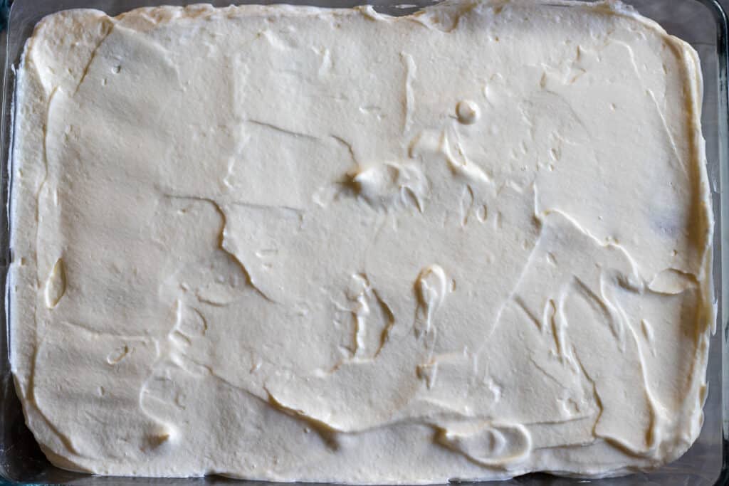 Mascarpone filling spread evenly on top.
