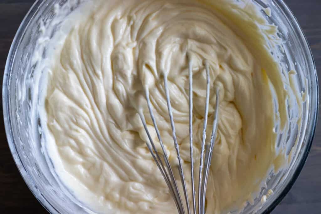 Mascarpone added to the egg yolk and sugar mixture.