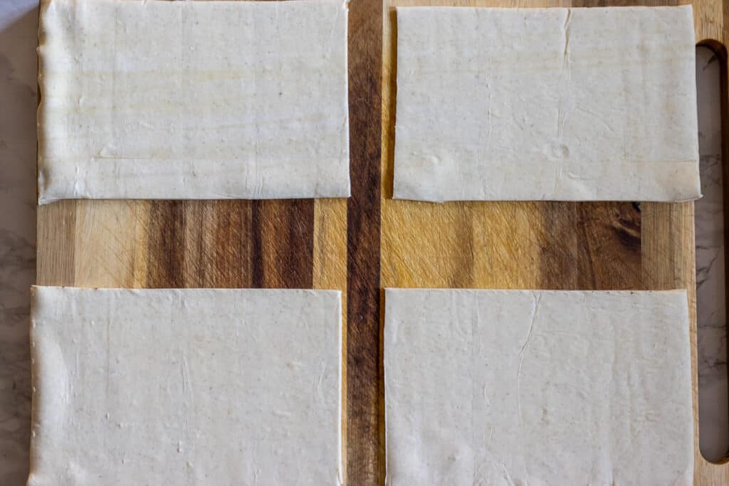 Puff pastry cut into four equal rectangles.