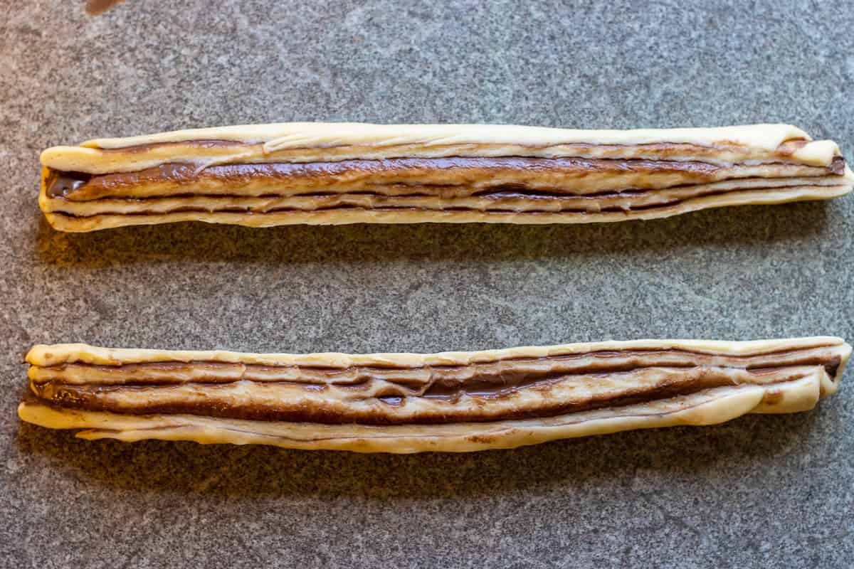 The dough log cut in half lengthwise.