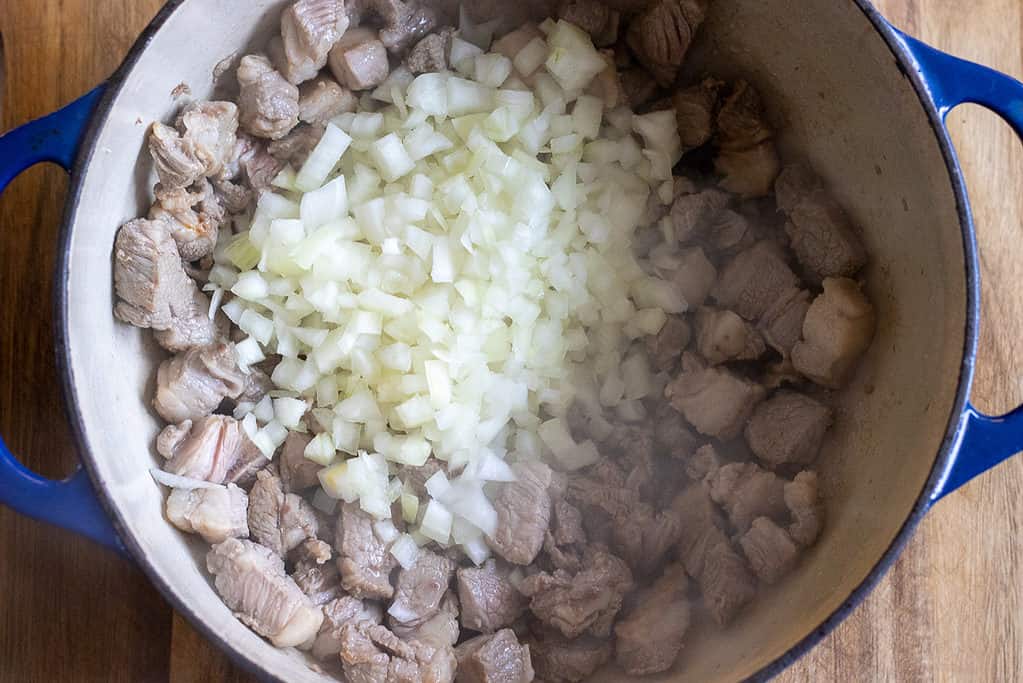 Sautéing the onions until soft.