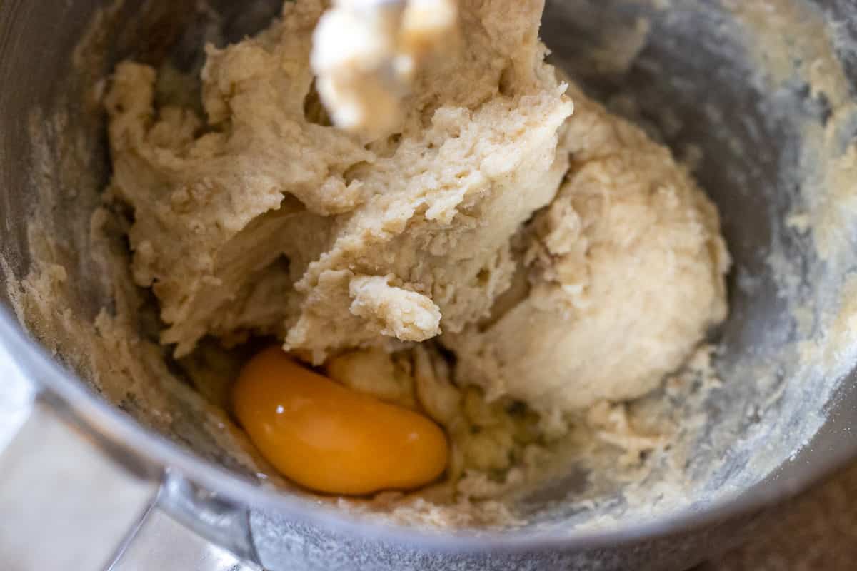 An egg yolk is added to the dough.