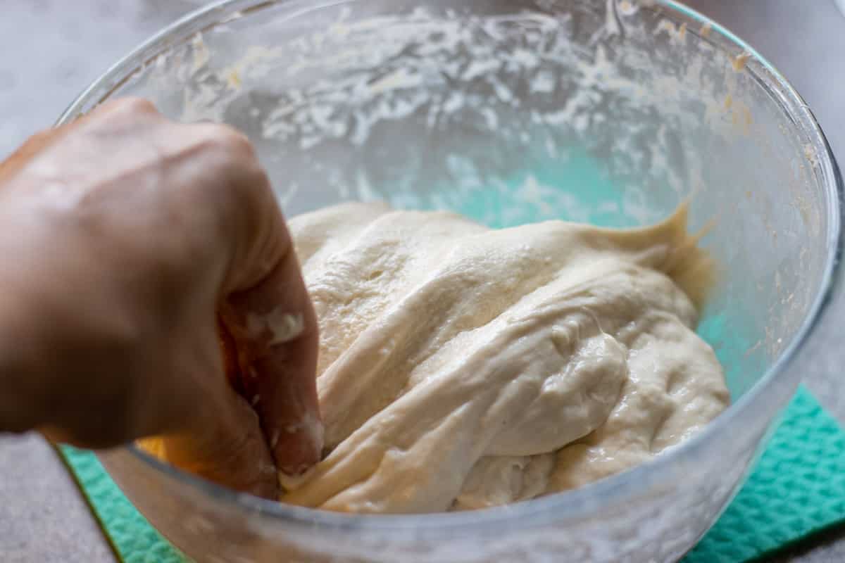 Folding the dough after stretching.