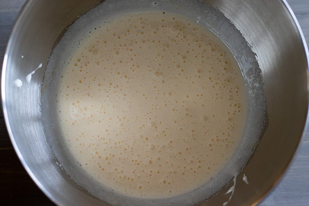 Eggs and sugar are beaten until fluffy.