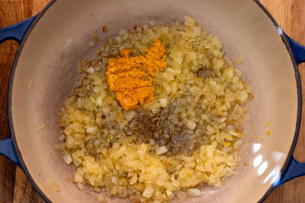 Ginger garlic paste and cumin seeds added to the onions.