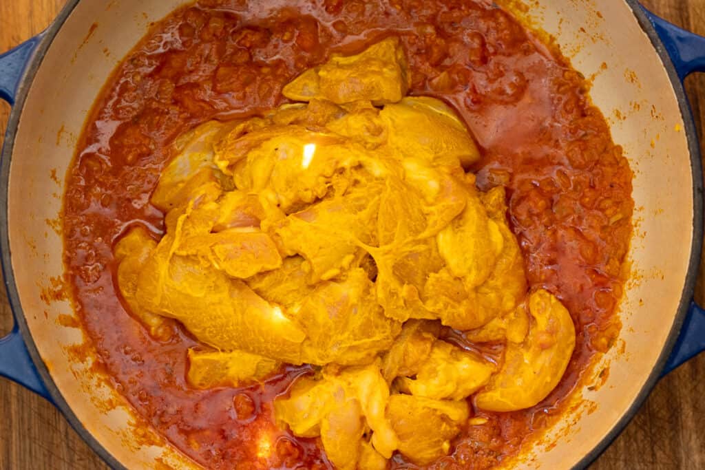 Marinated chicken added to the gravy.