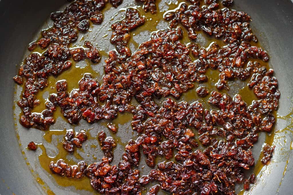 Barberries are softened with butter and sugar.