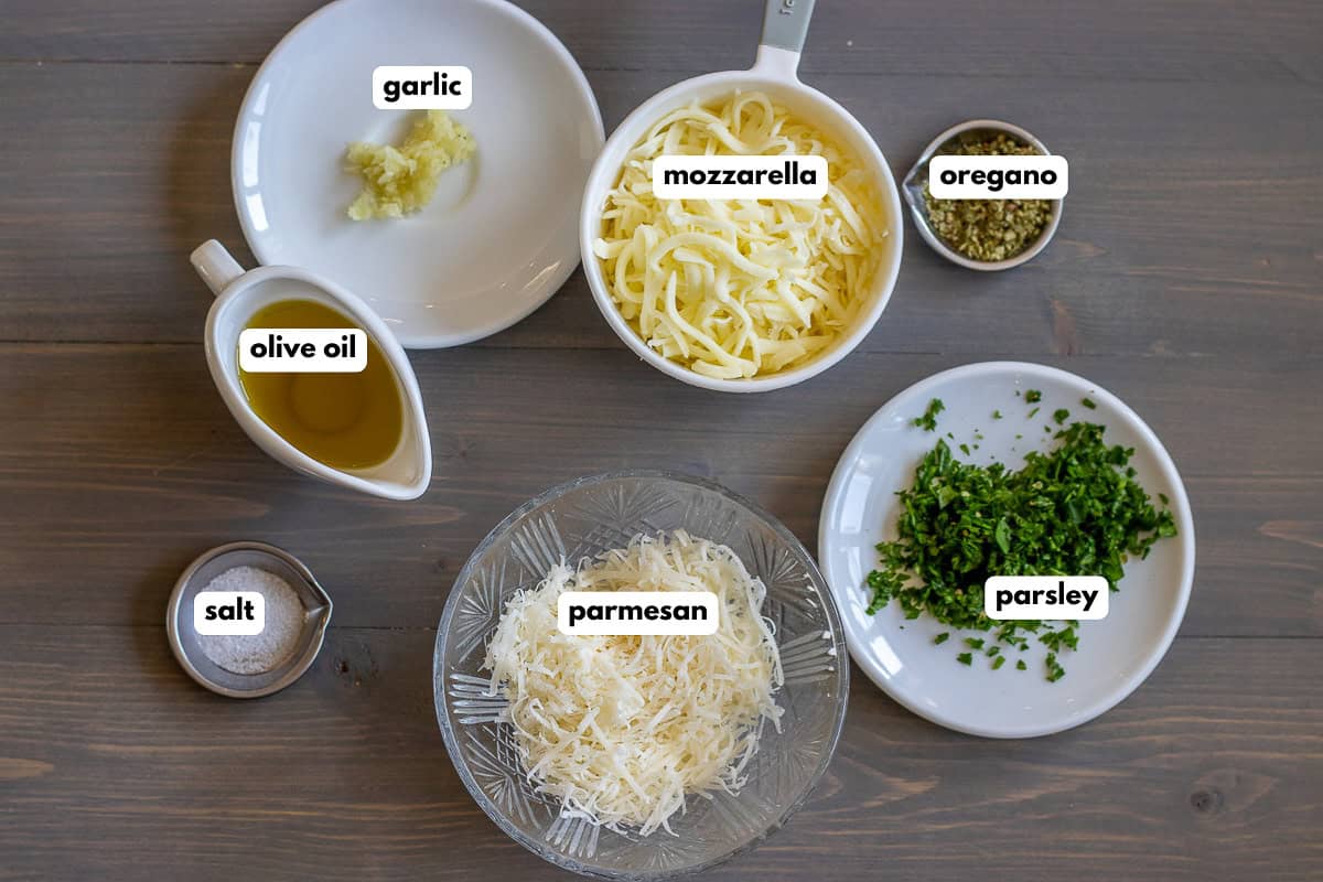 Labelled ingredients for the cheese topping.