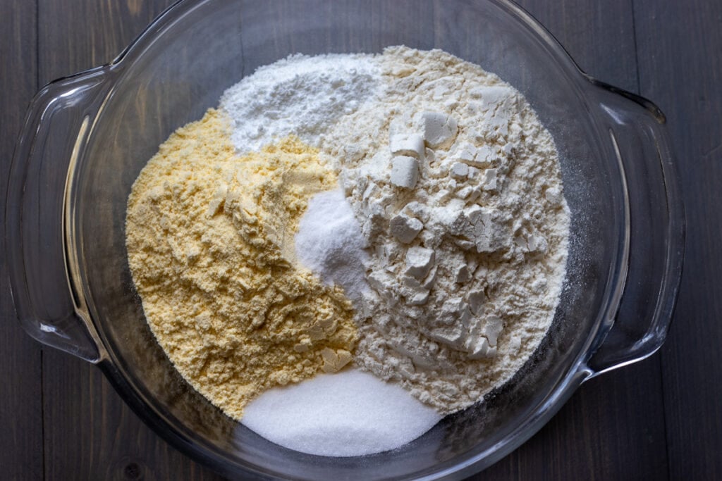 Dry ingredients for Mexican cornbread in a mixing bowl.