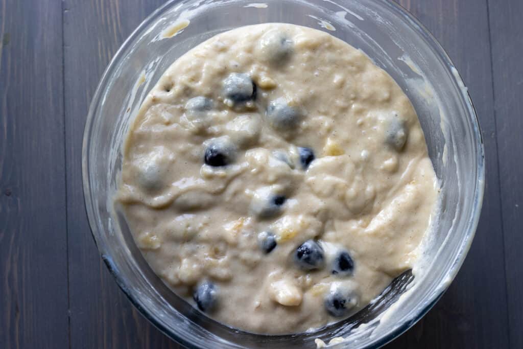 Blueberries are added to muffin batter.