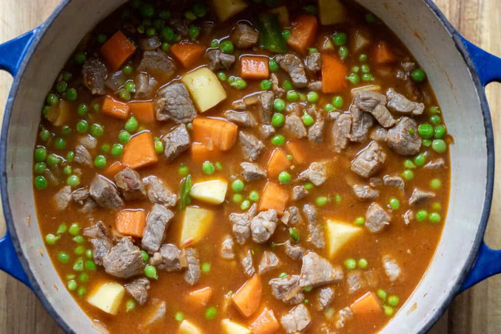 Water added to the pea stew before simmering.