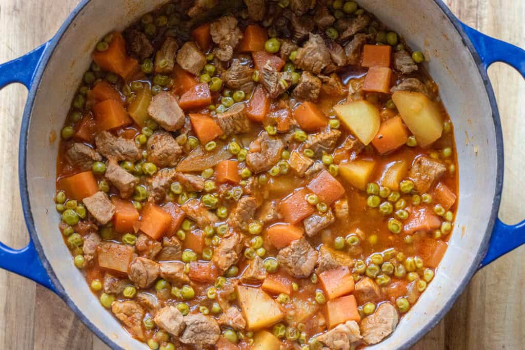 Pea stew cooked until the meat and vegetables are tender.