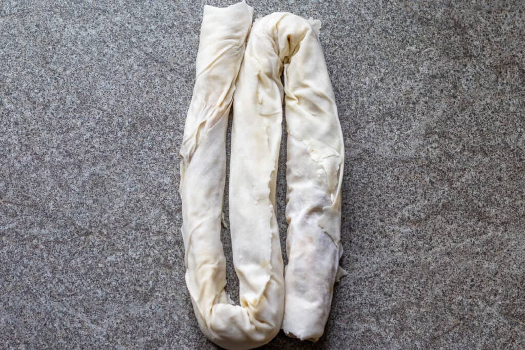 The long roll folded into thirds to make the arm shape.