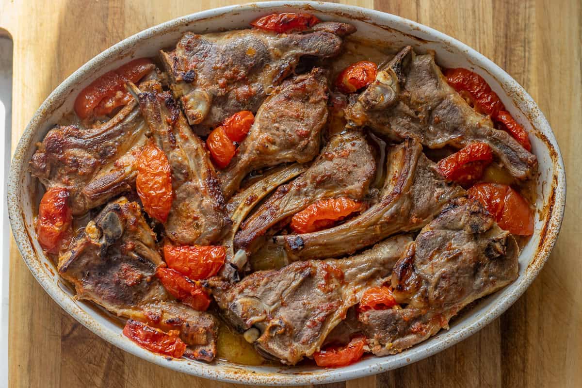 baked lamb chops with vegetables in a tray