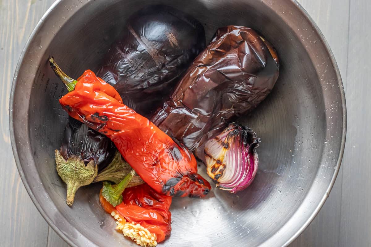 eggplants, red onion, and red peppers are chargrilled until soft
