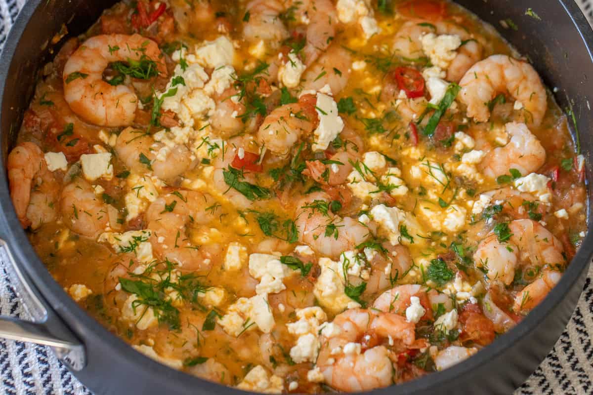 Succulent shrimp and crumbled feta cheese in a flavorful tomato sauce with herbs.