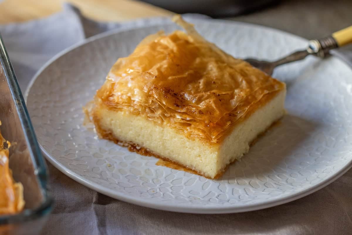 a slice of galaktoboreko on a white plate