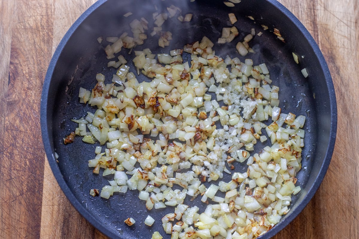 Sauteing onions and garlic in olive oil.