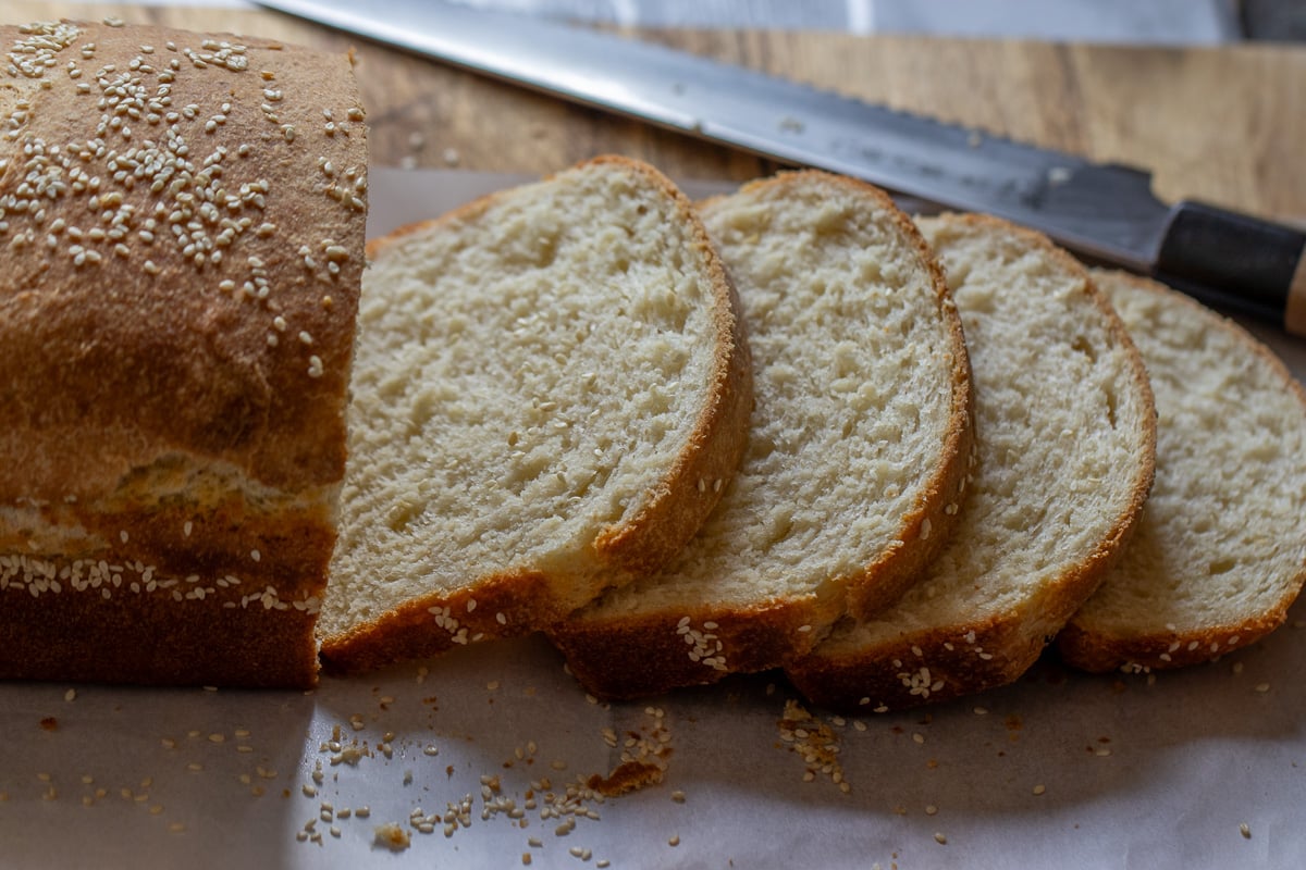 Slicing the bread after it had cooled down.